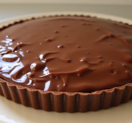 La tarte poire-chocolat de Cyril Lignac : une recette simple et délicieusement gourmande